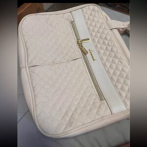 Elegant Cream Quilted Travel Bag